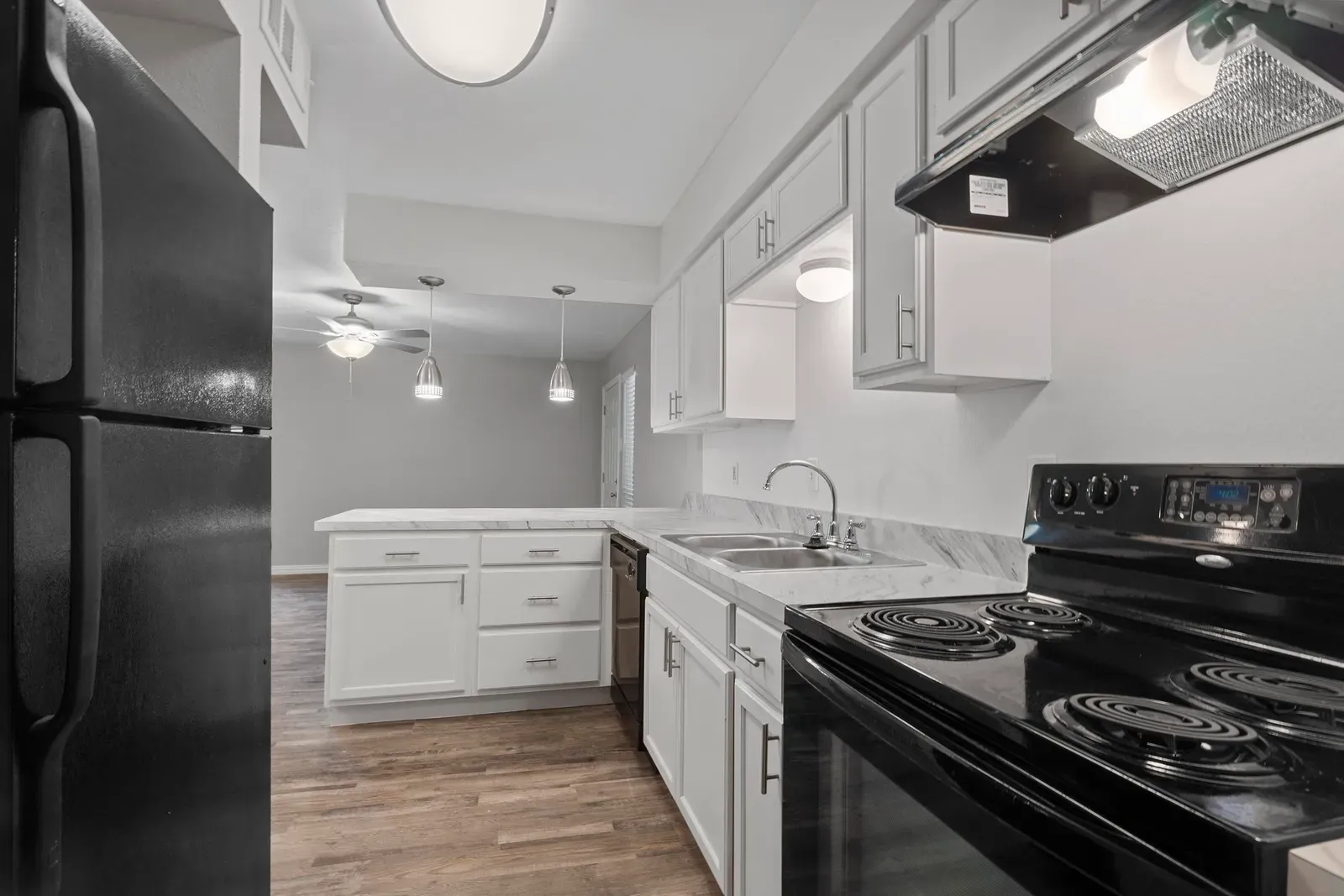 Renovated kitchen with marble countertop